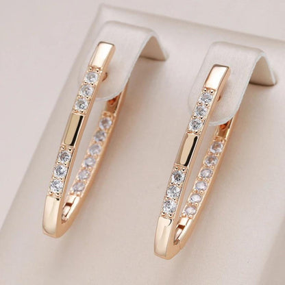 Boucles d'oreilles élégantes en zircone dorée 