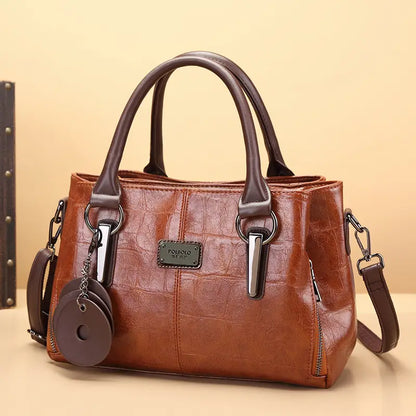 Sac Boston rétro en cuir véritable à la mode