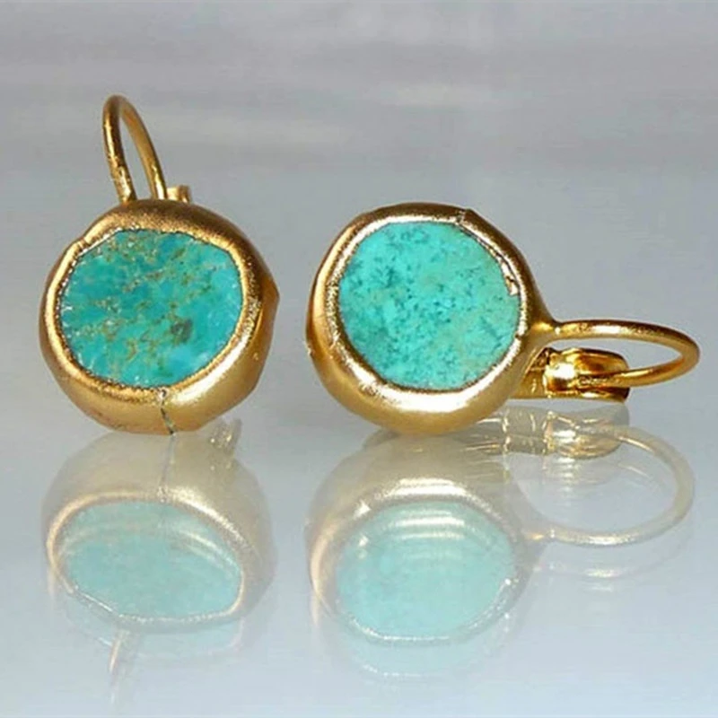 Boucles d'oreilles en or avec pierre turquoise 