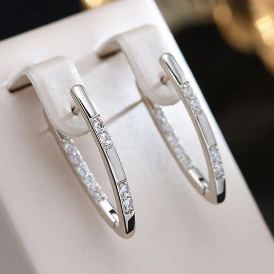 Boucles d'oreilles élégantes en zircone dorée 