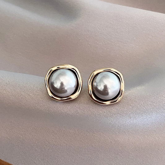 Boucles d'oreilles élégantes en perles noires 
