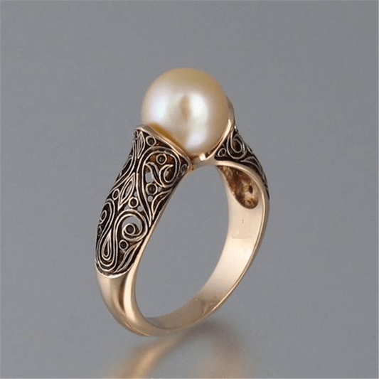 Bague dorée vintage avec perles 